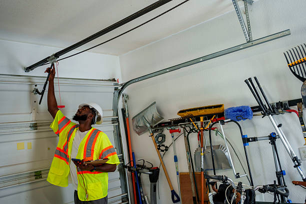 Professional Garage Door Panel Replacement technician working in Grundy Center, IA